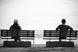 Grayscale Photo 2 Person Sitting in a Separate Benches on the Seaside. From Serkan Göktay via Pexels (https://www.pexels.com/photo/black-and-white-sitting-waiting-young-90639/), cc (https://creativecommons.org/licenses/by/2.0/)